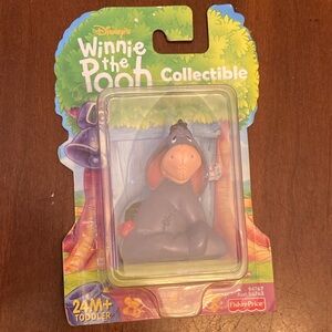 Vintage Fisher-Price Winnie the Pooh collectible figure “Eeyore”